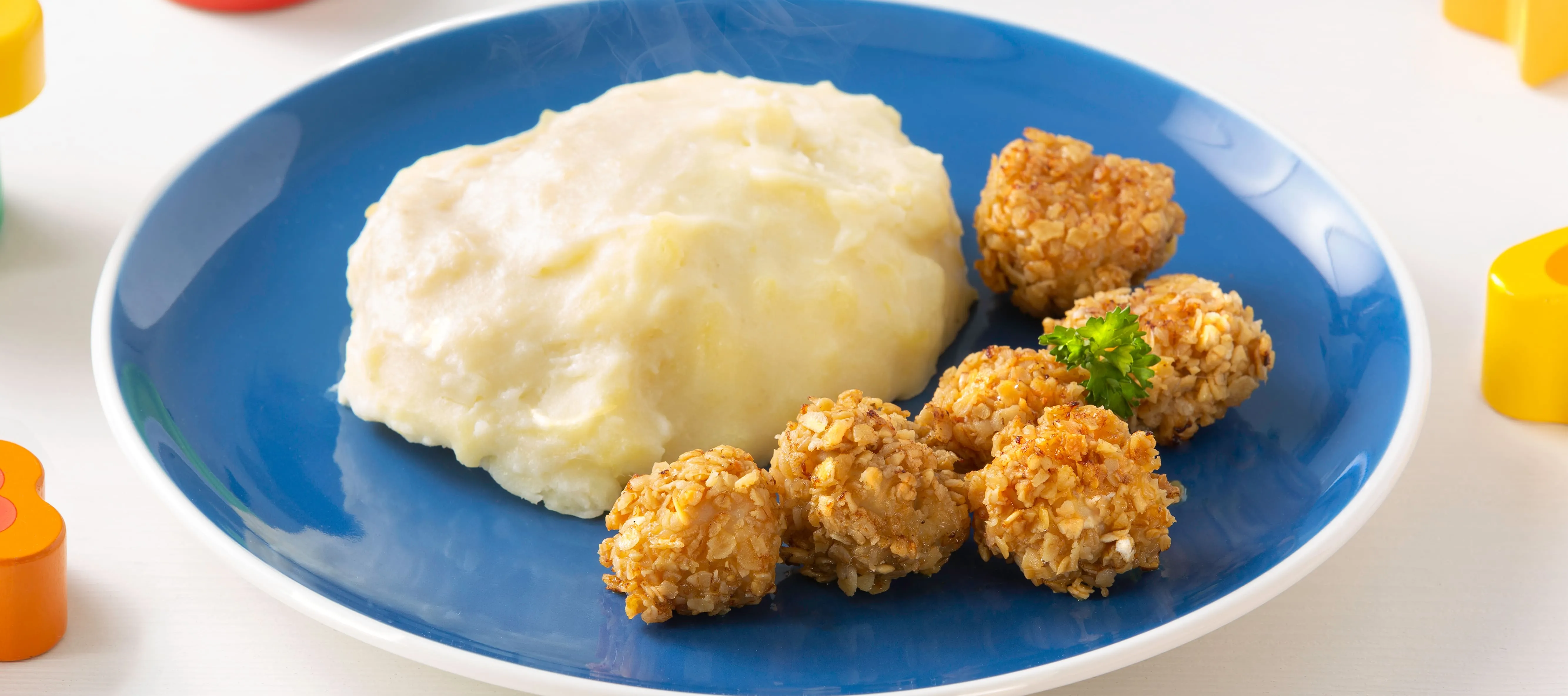 Cubitos de pollo crispy con puré de coliflor